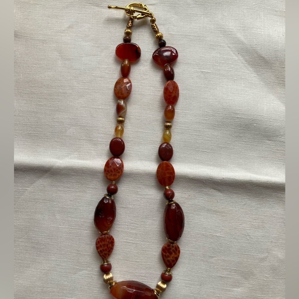 This is a Carnelian gemstone beaded necklace with gold-tone clasp. - Picture 2 of 2
